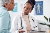 doctor talking to patient