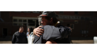 Two people hugging