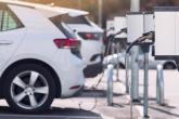 An electric vehicle being charged