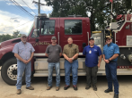 4 Livingston firefighters in front of truck