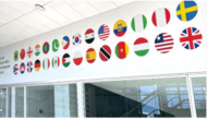 Circular cropped flags above a doorway