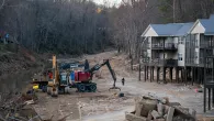 A storm damaged apartment complex in a landscape scarred by Hurricane Helene on March 24, 2025, near Swannanoa, North Carolina. More than six months after the historic storm, communities in western North Carolina continue the recovery process. (Photo by Sean Rayford/Getty Images)