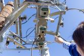 people working on a utility