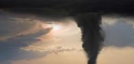 Photo of a tornado in the sky 