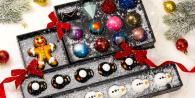 Assortment of ornaments in a gift box.