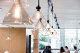 A row of lights hanging from a ceiling