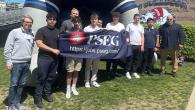 people holding a PSEG banner