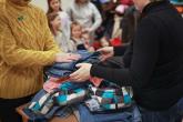 People handling clothing