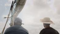 two people on a boat
