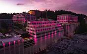 T-Mobile office building at dusk with pink exterior lighting