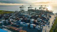 Aerial view of containers at a port by the ocean