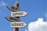 Signs with text "Help, Support, Advice, Guidance"