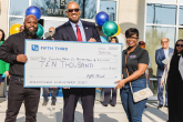 People holding an oversized check from Fifth Third