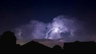 A thunderstorm over a residential area.