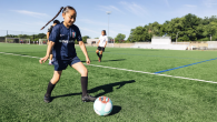 child playing soccer