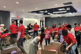 volunteers at back to school event