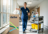 Cleaning professional taking something out of a thrive box