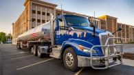 18 wheeler parked in front of a building