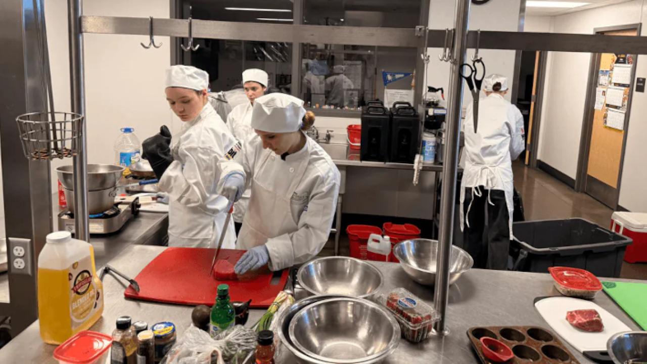 people working together in a kitchen