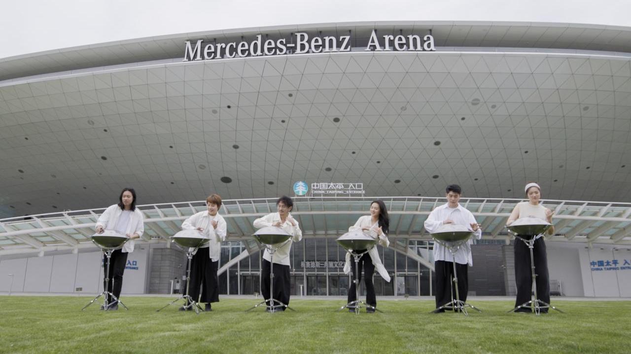 Aether band performs in front of Mercedes-Benz Arena Shanghai.