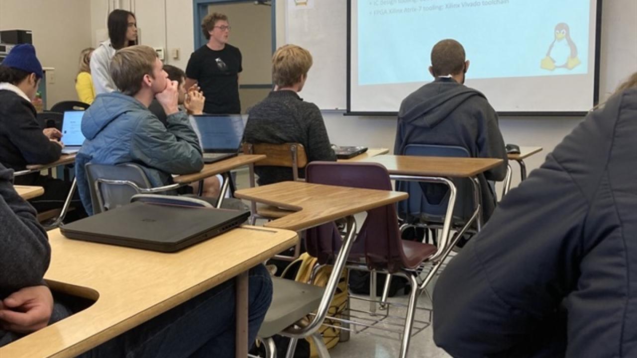 students learning from a powerpoint
