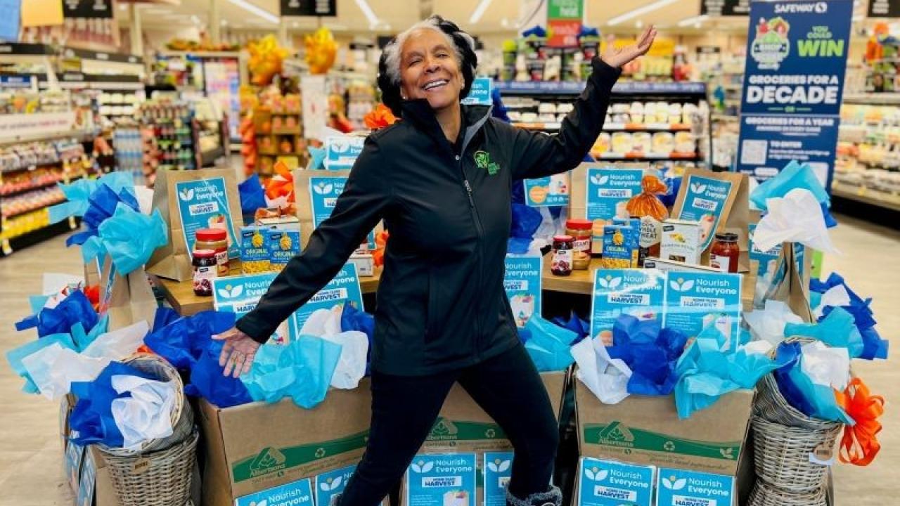Angela Swanson, president of Feeding Feasible Feasts, poses in Albertsons