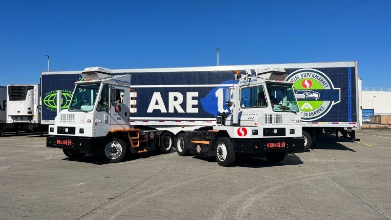 Two electric switch engines at shipping yard