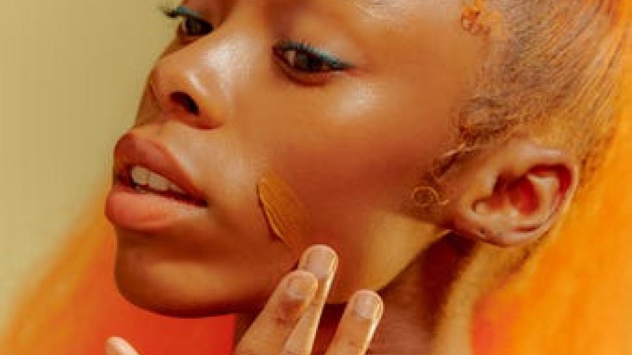 person putting on makeup