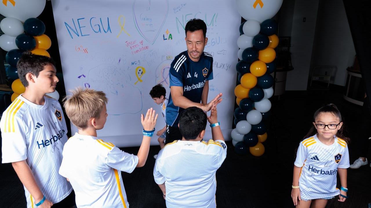 The NEGU youth and their families met the LA Galaxy players before starting the Boot Making Lab.
