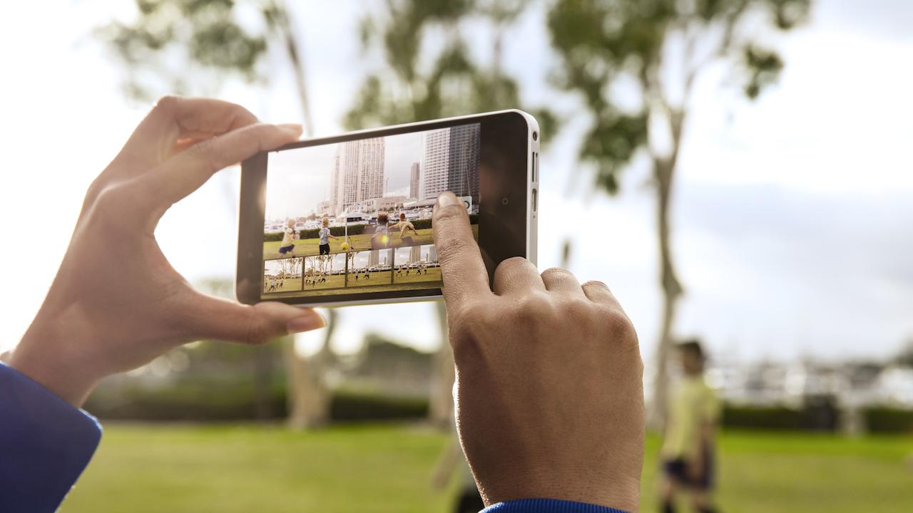 Hands taking a picture with a phone