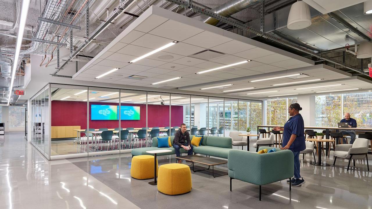 Inside of facility with chairs and lots of windows