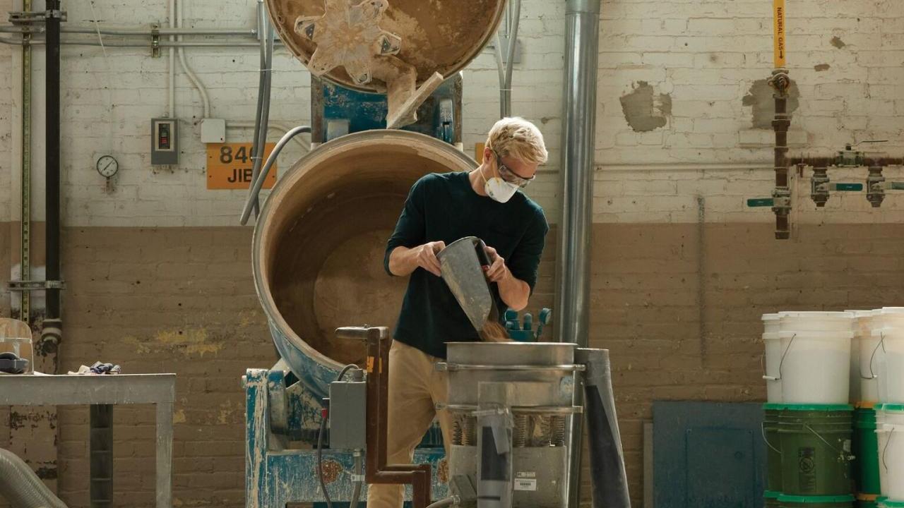A person repurposing pottery