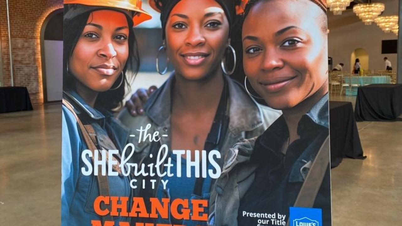 She Built This City Change Makers Conference sign