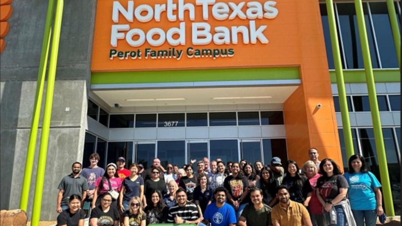 Group of people posing outside North Texas Food Bank