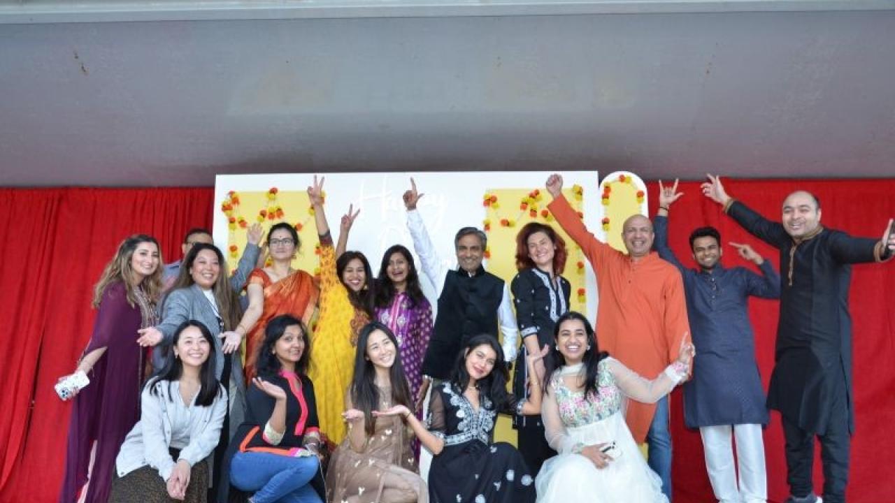 Group of people posing at Diwali celebration