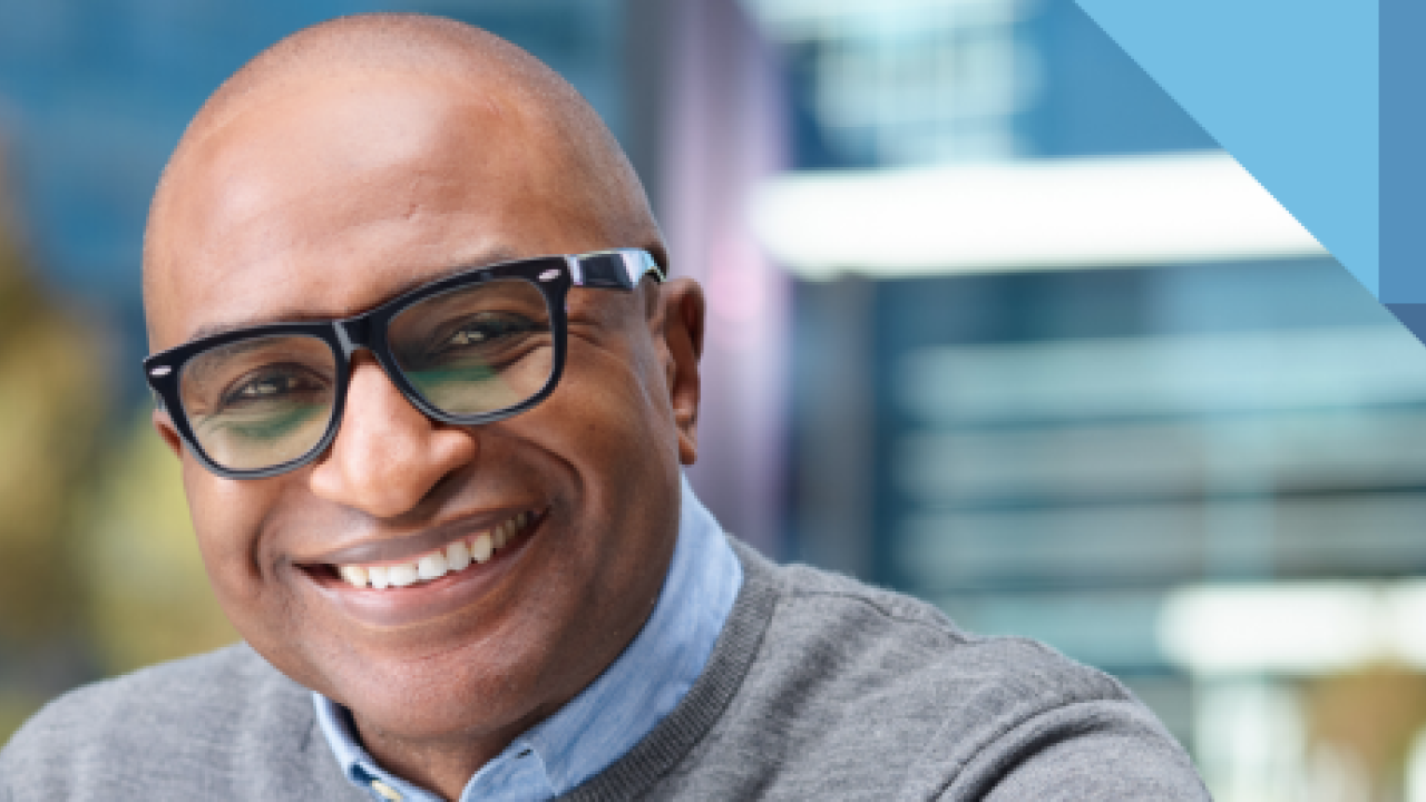 Man in glasses smiling