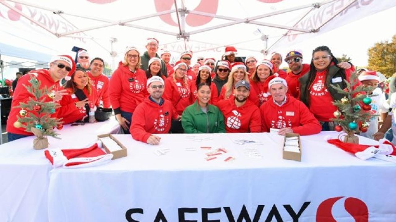 Group of people at Safeway table 