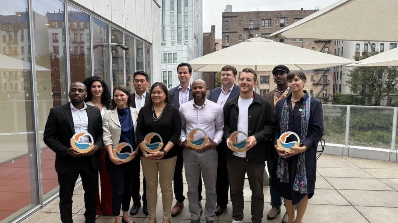 Honorees posed together with award