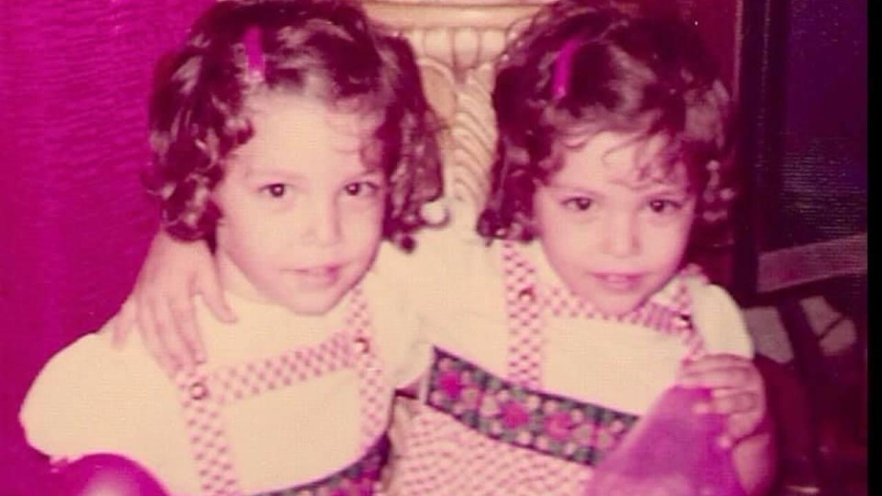Wanda with her twin sister Yolanda, around the age of four