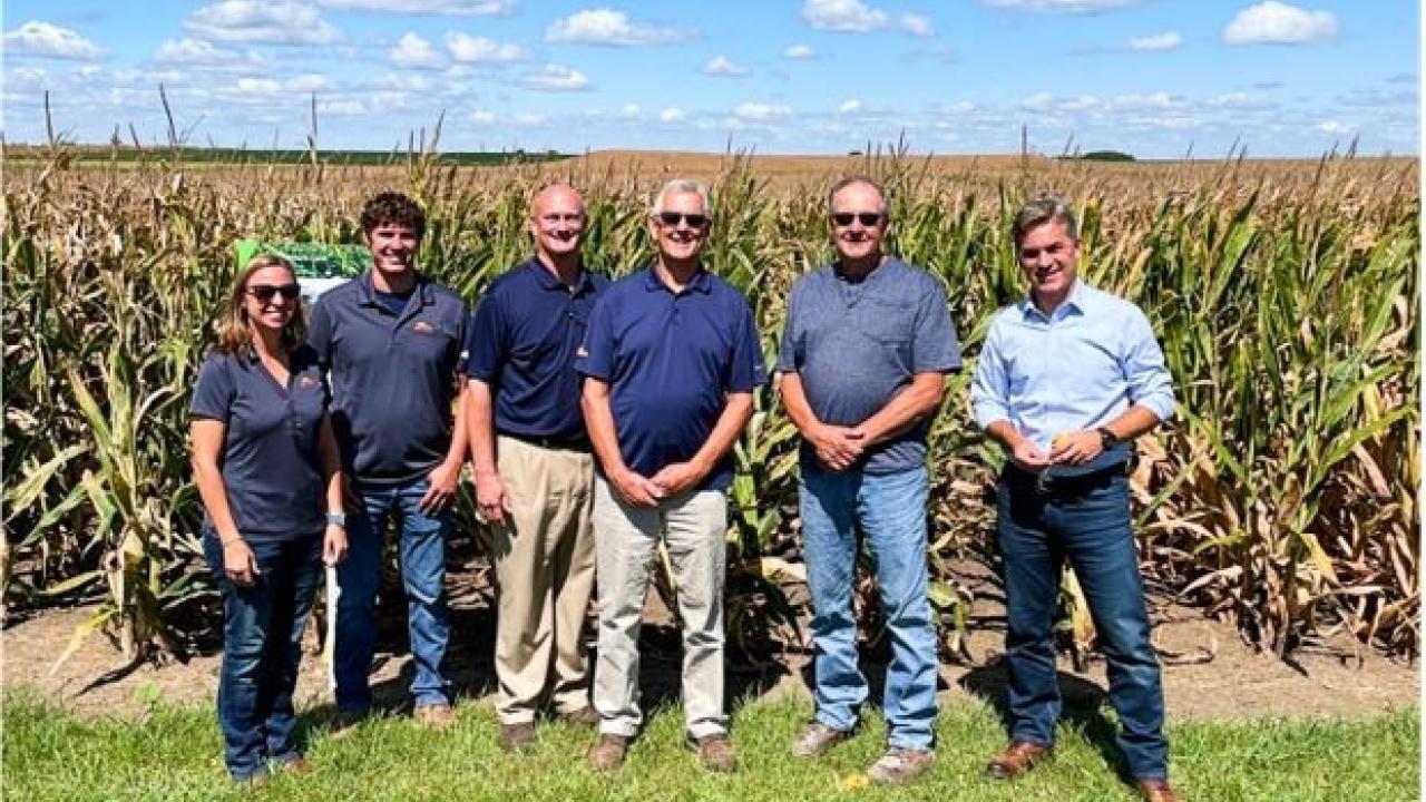 Rodrigo Santos with the Bachman family on their farm in Illinois