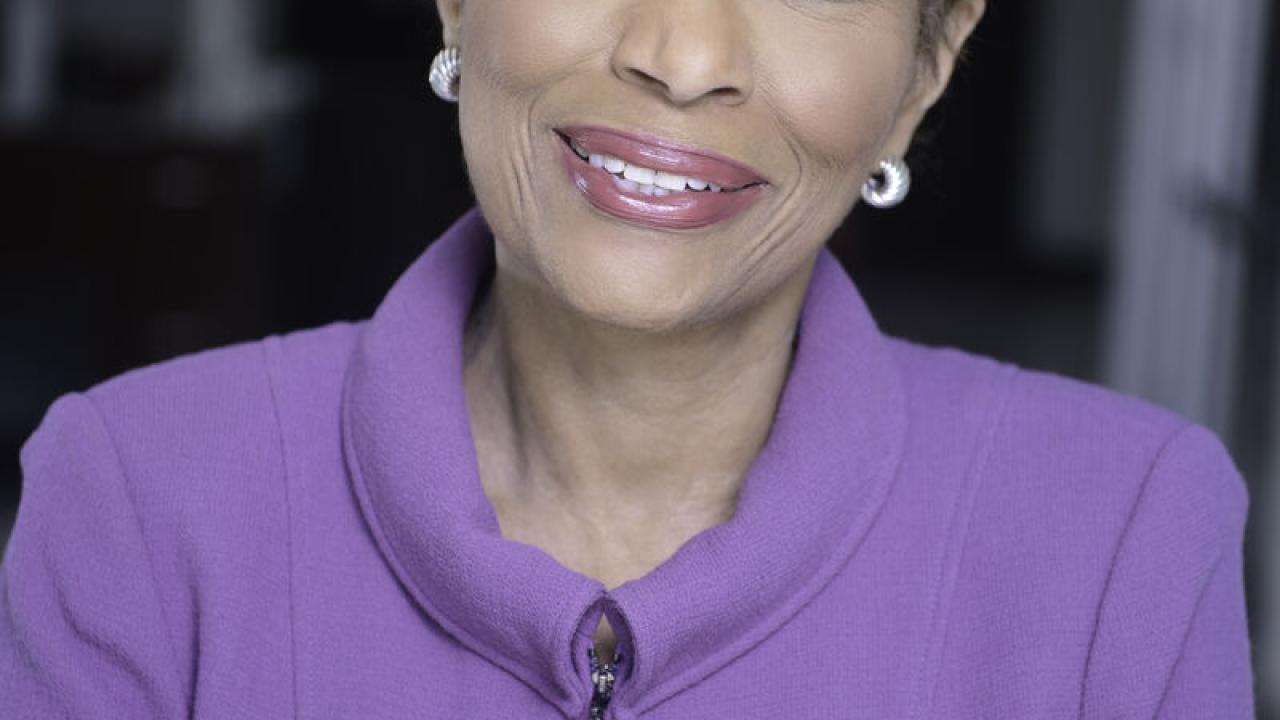Juanita Baranco in a purple jacket