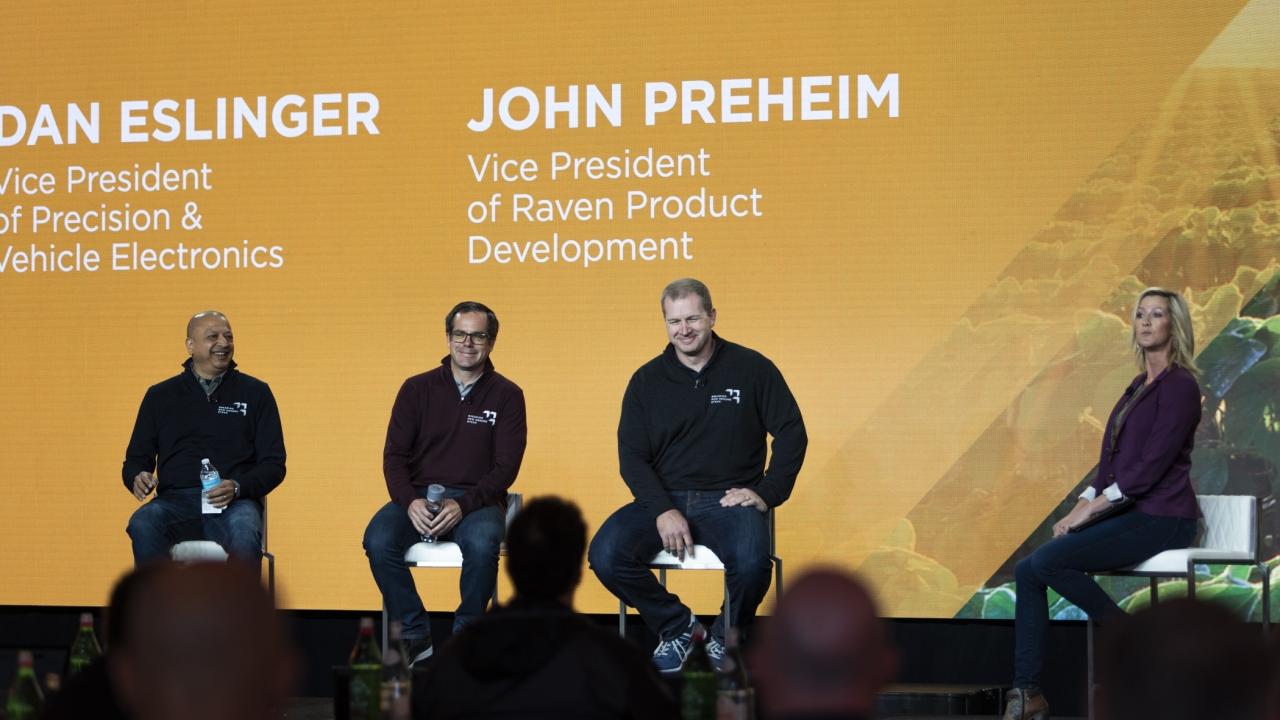 People sitting on a stage.