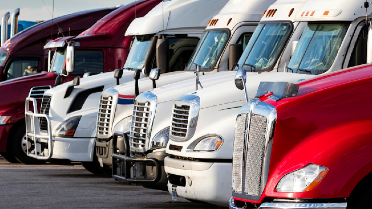 line of big trucks