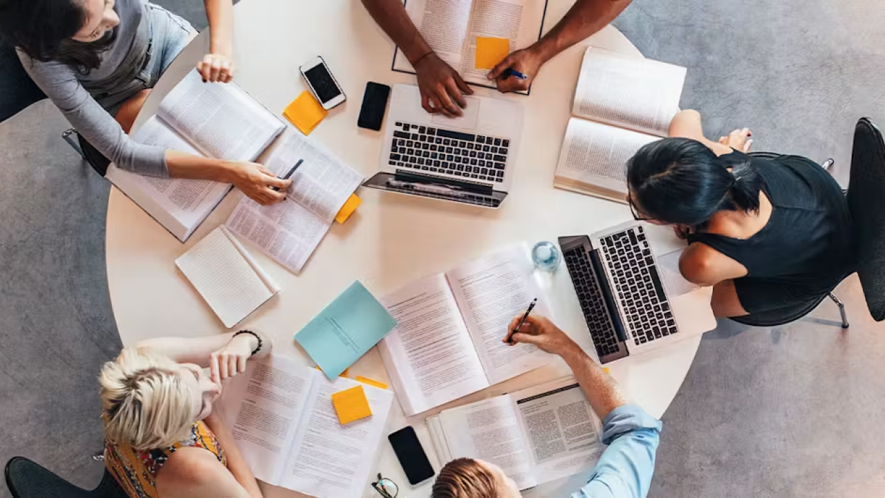 People working together on a round table