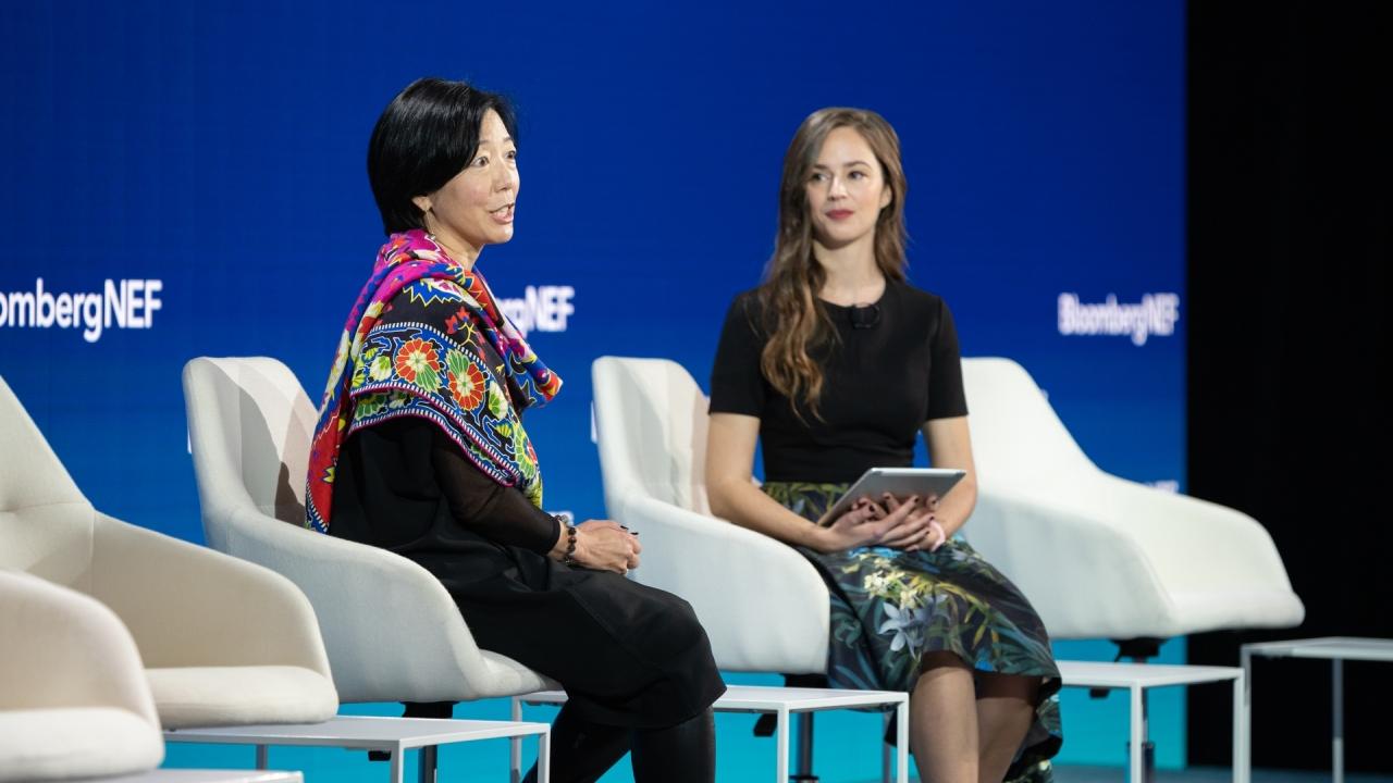 Two people in discussion: Edison International's Caroline Choi highlighted the company's nearly $800 million transportation electrification program, the largest for an investor-owned utility, at the BNEF Summit in San Francisco.