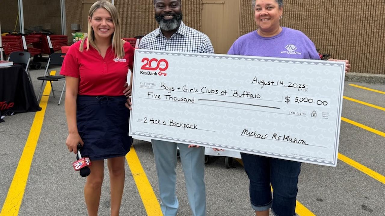 KeyBank and Boys & Girls Clubs of Buffalo shown with a $5,000 check.