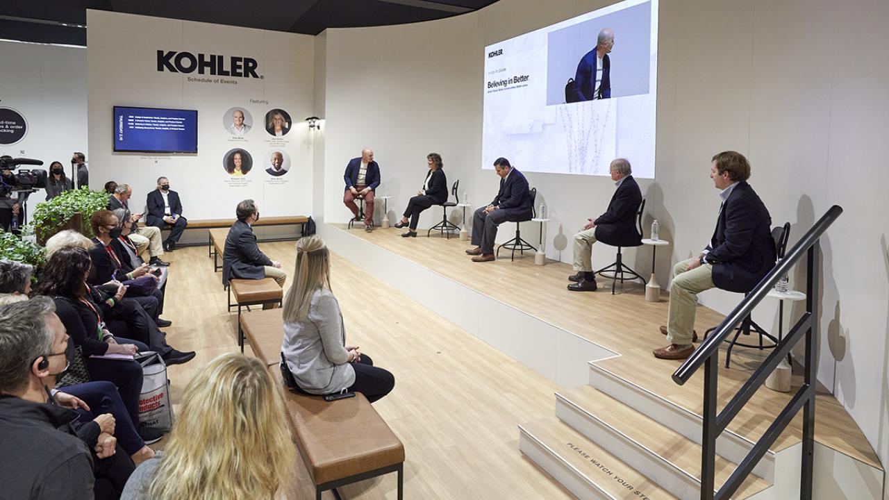 panel of speakers with audience