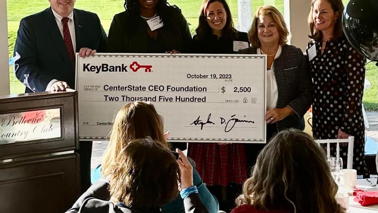 KeyBank Key4Women event; donation check of $2,500 shown.