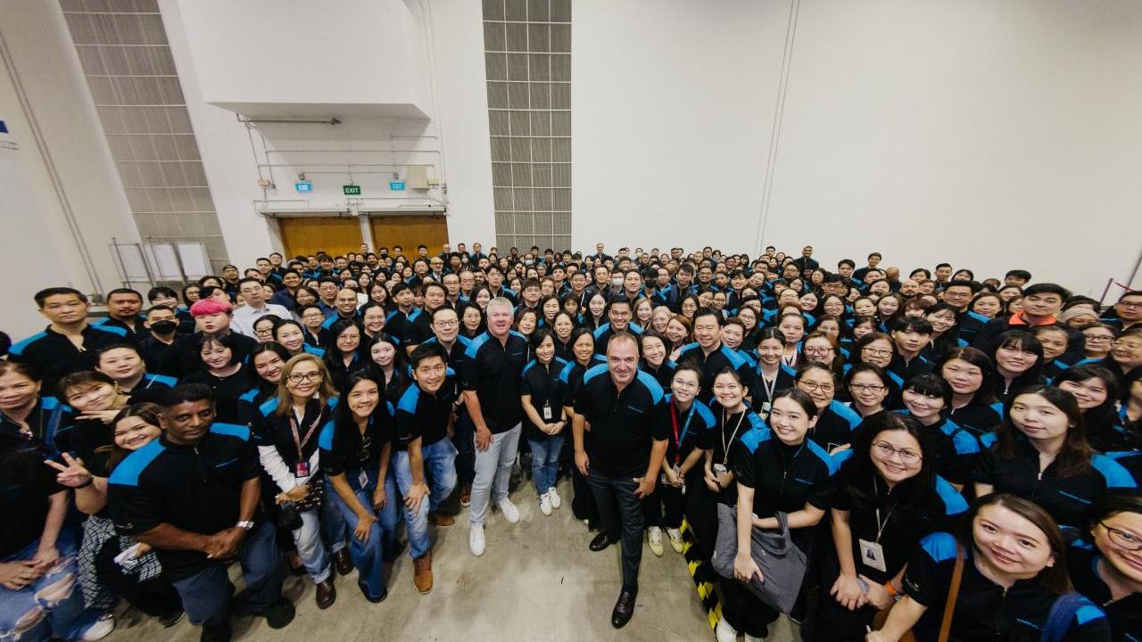 A large group of people posing for the camera