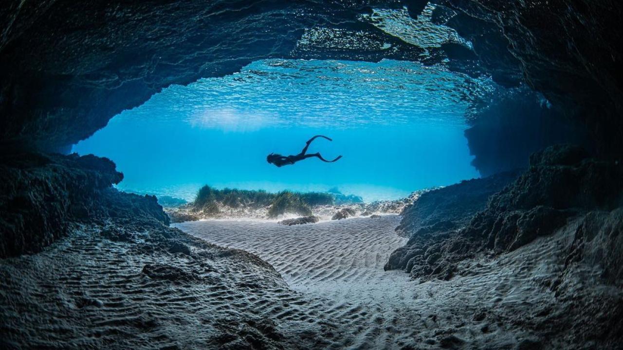 underwater shot of Gádor snorkeling with swim fins
